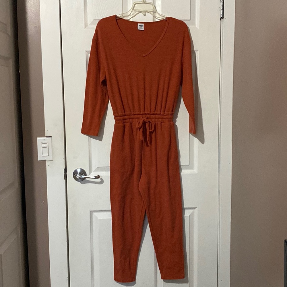 Smash + Tess long sleeve drawstring waist romper.